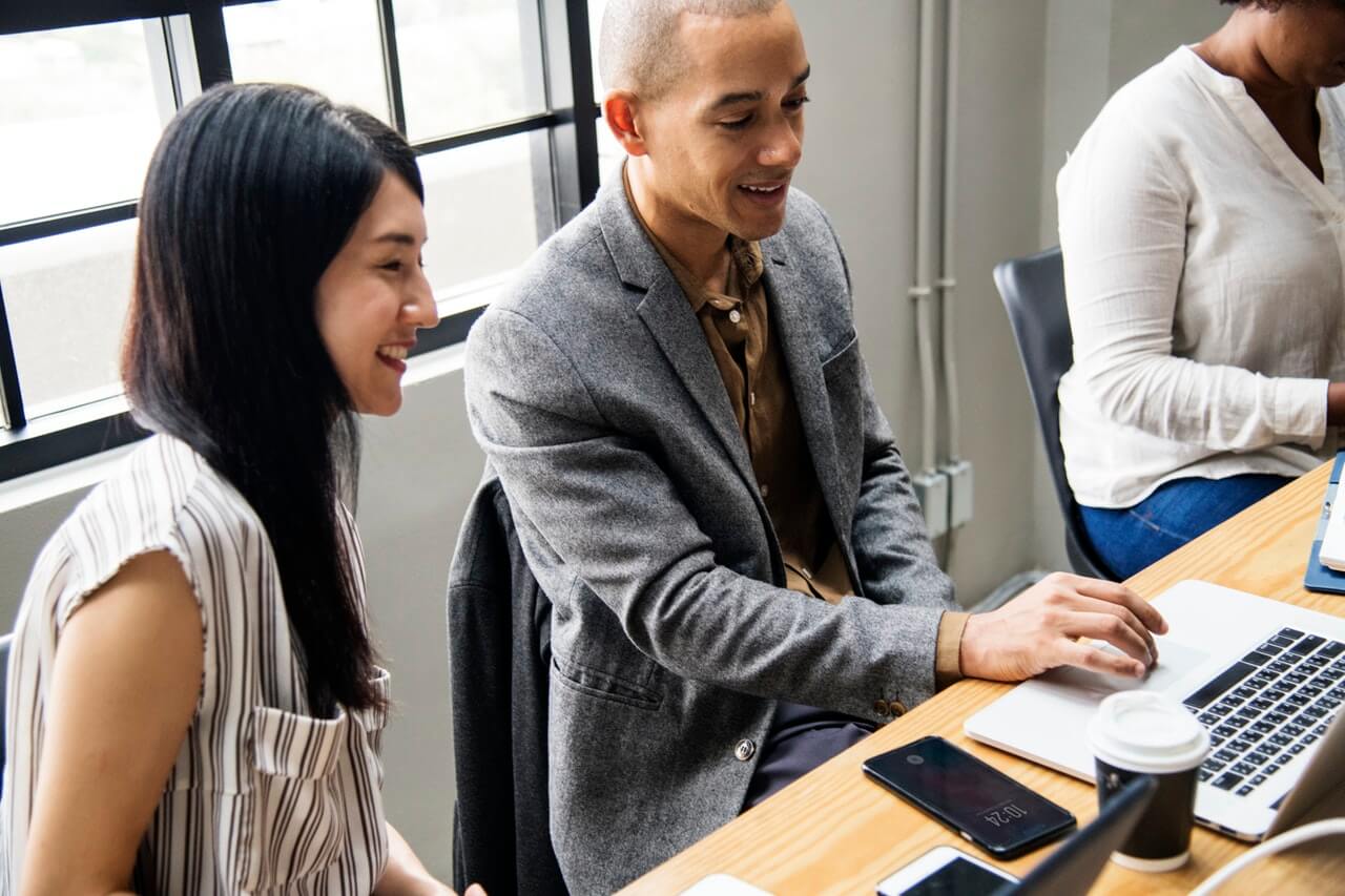 man and woman with positive workplace culture