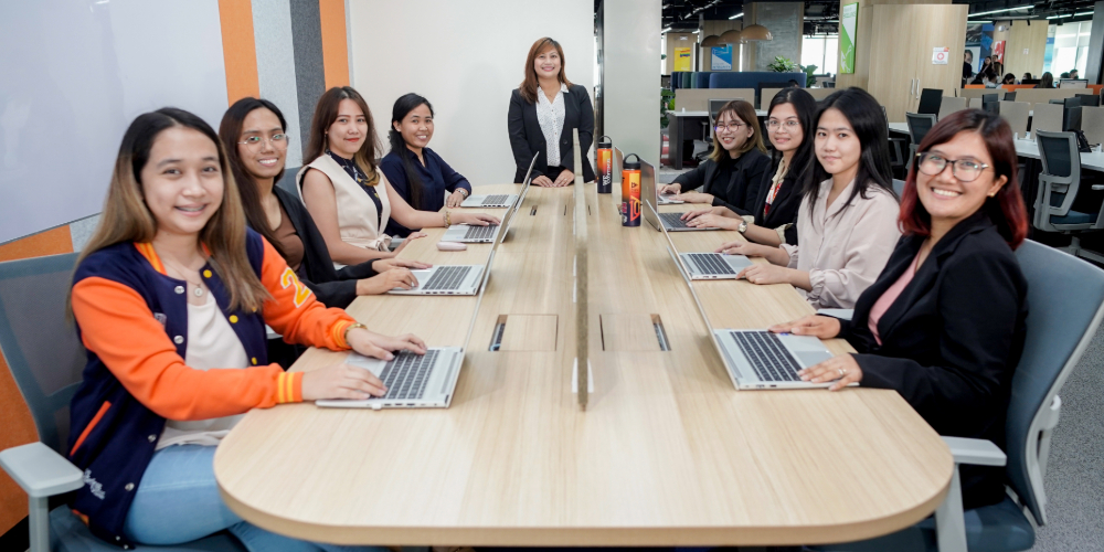 A middle manager and her team