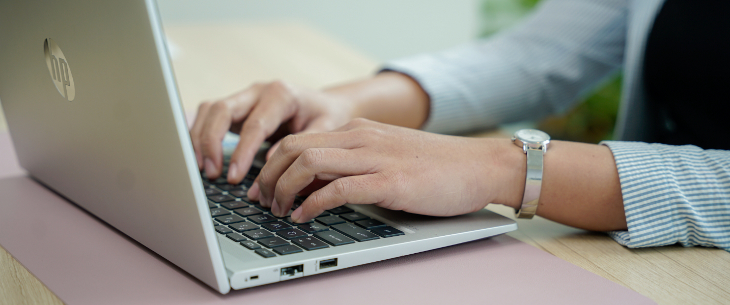 An auditor preparing an audit report based on their opinion on the company's reported financial information.
