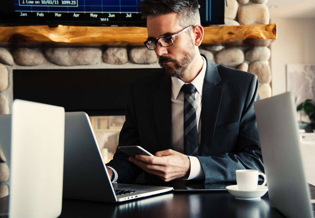 man reading about corporate secretary duties