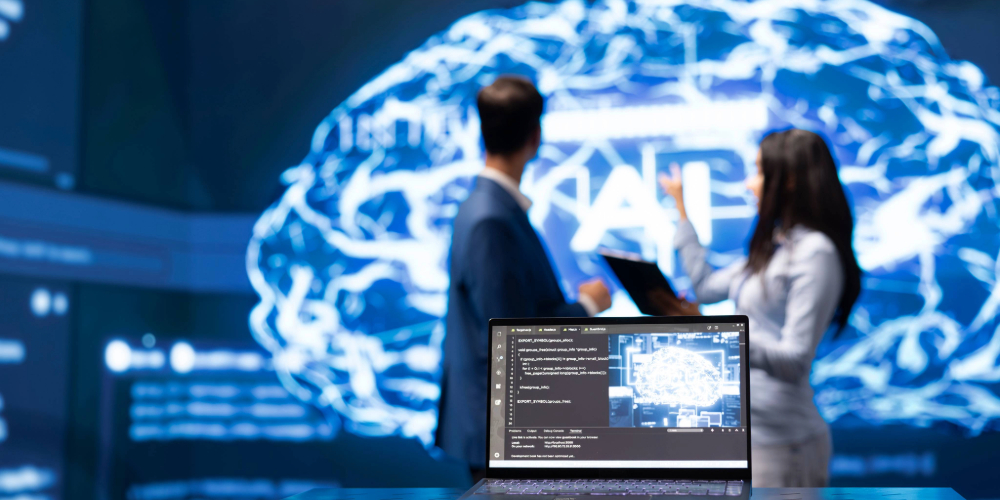 Two accountants learning the uses of AI in management accounting