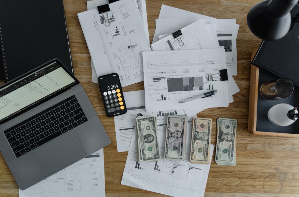 A table where all the assets of the company is laid across it.
