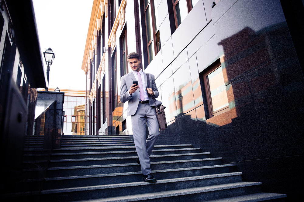 Small business owner using mobile accounting software