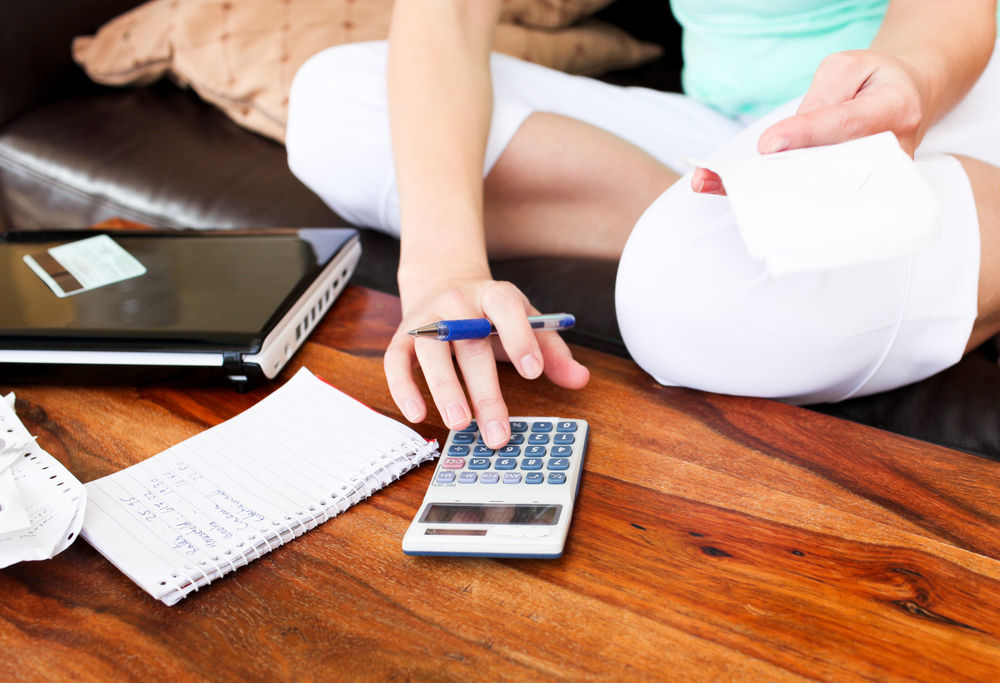 Woman creating a budget guide for business