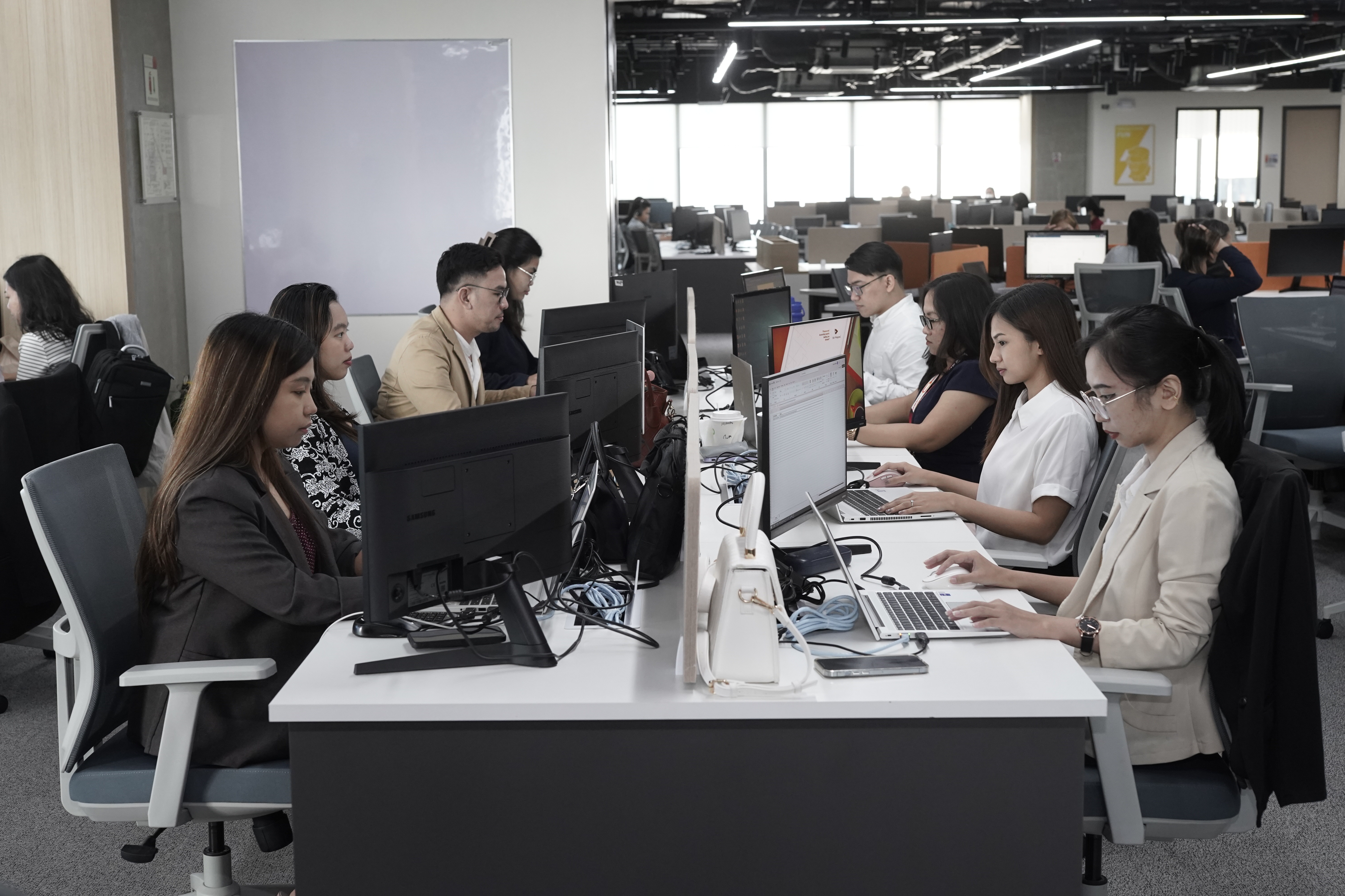 a team reaping the benefits of their company’s digital transformation
