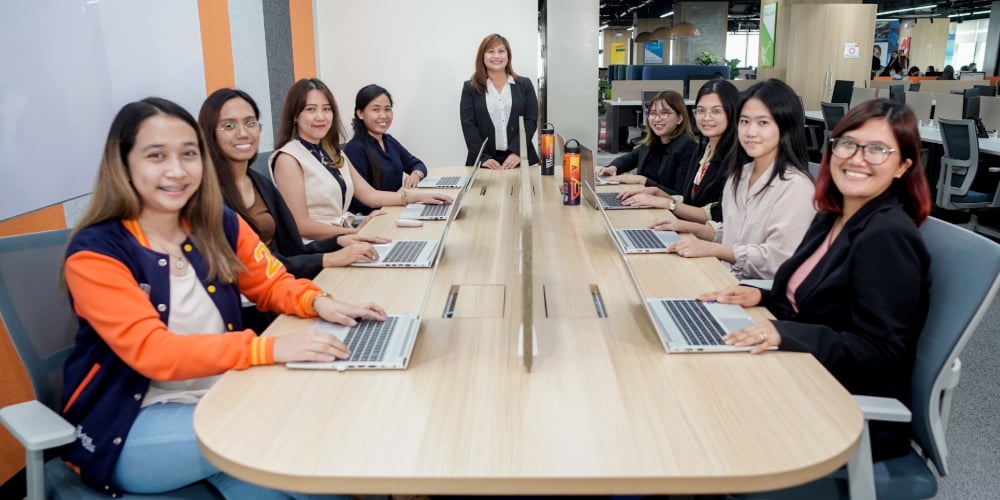 A middle manager and her team