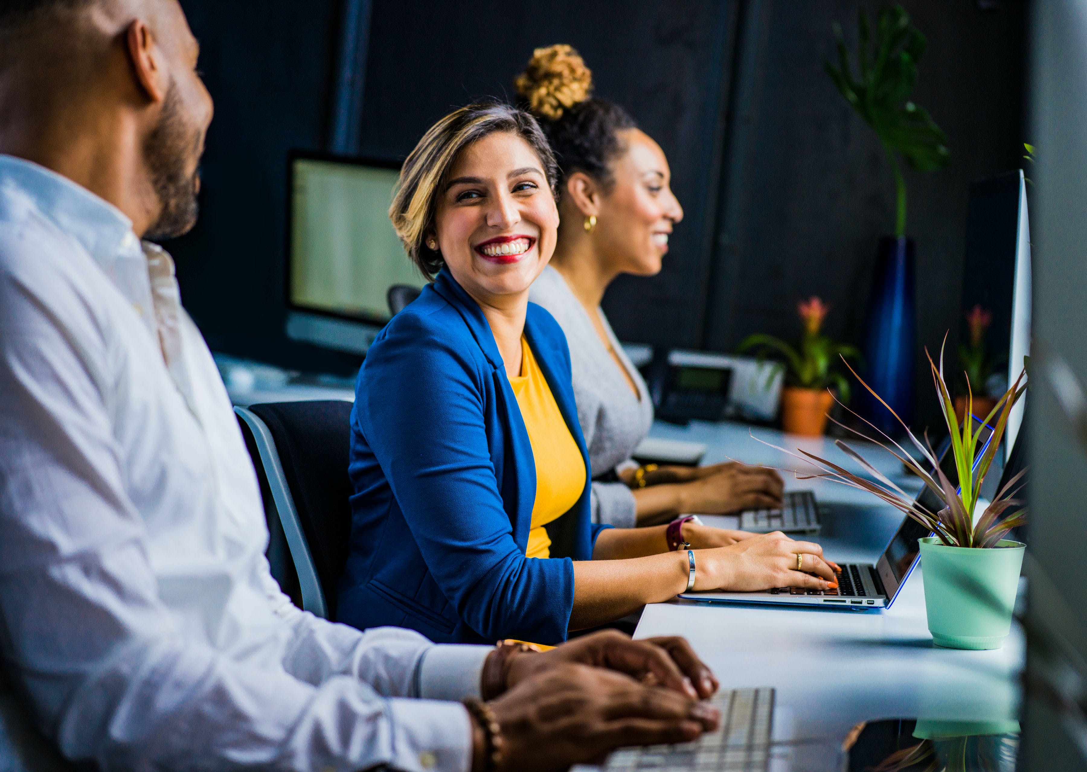 a happy accounting team as they learn how to automate their accounting processes