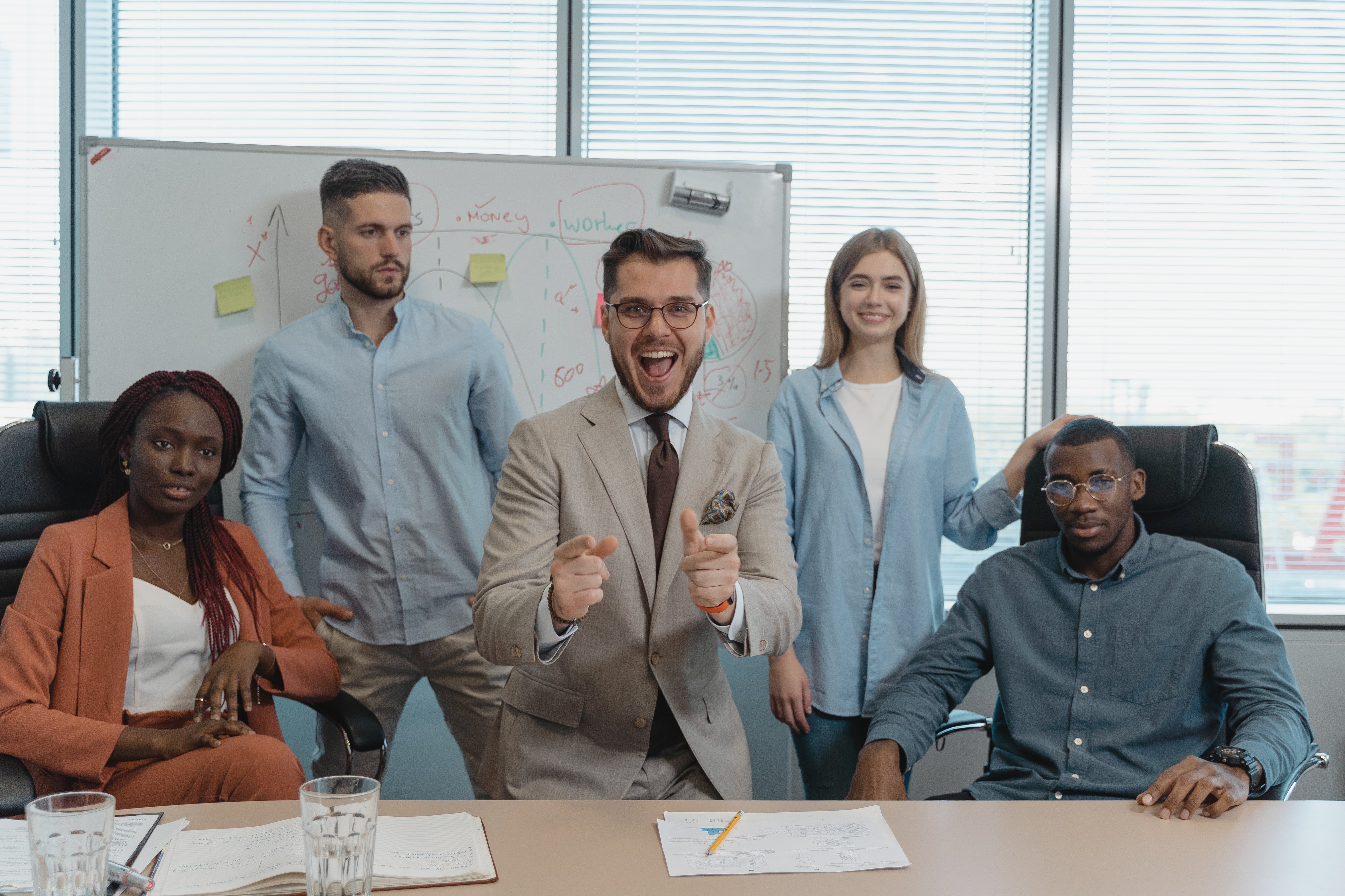 a team happy about their growing workforce