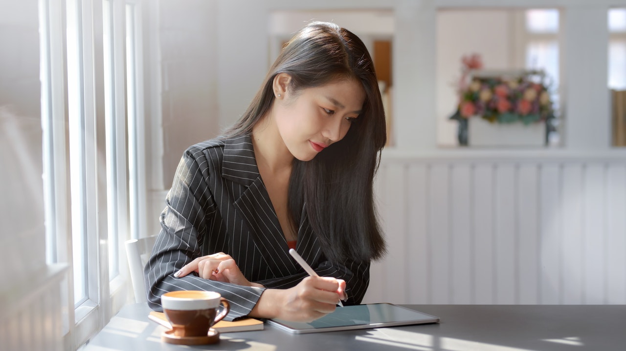 Woman considering outsourced accounting services